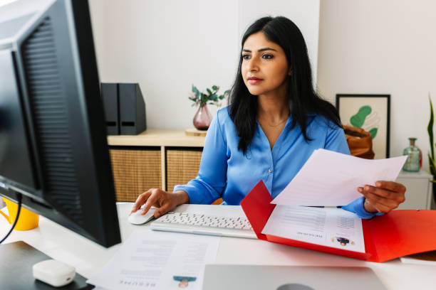 HR manager carefully reviewing a candidate's profile